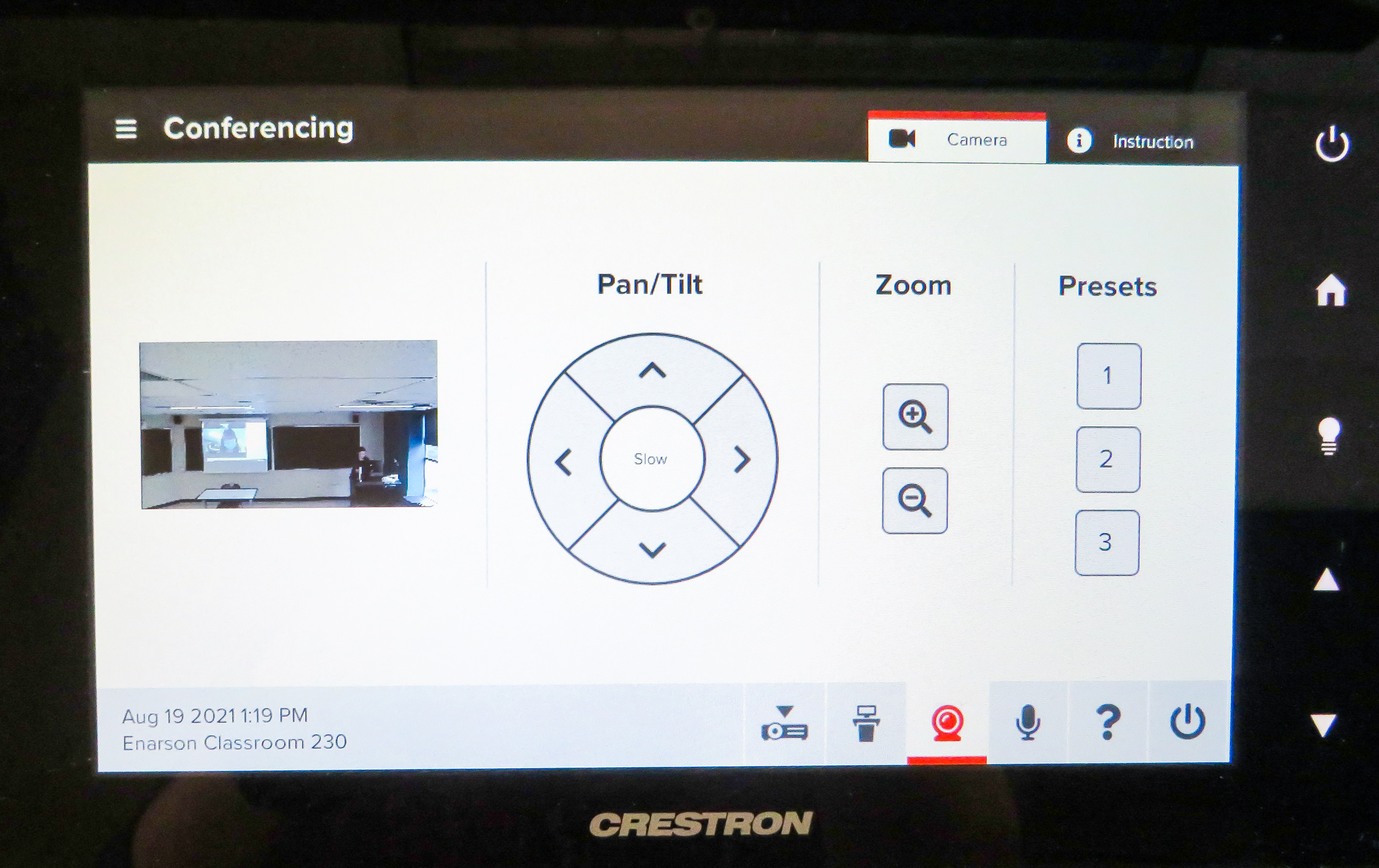 The control panel for classroom cameras, including the pan/tilt controls, zoom in and zoom out, and three preset buttons